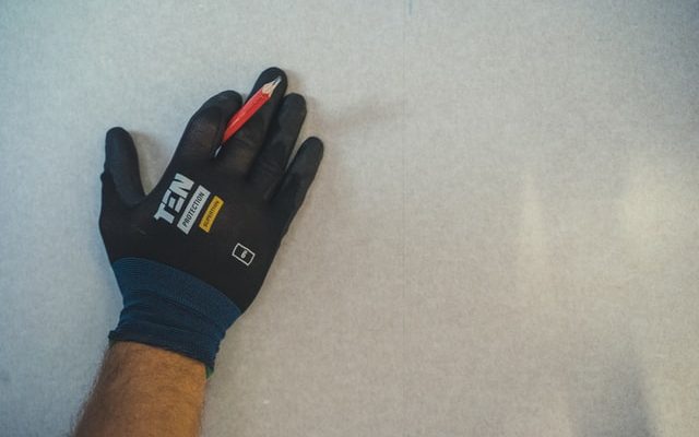 What are the factors for choosing the proper gloves against workplace injury